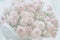 Light pale background with pink roses, romantic backdrop for many occasions