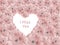 Light pink gerber daisies with heart shaped copy space and text