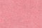 Light pink wavy background from a textile material. Fabric with fold texture closeup.