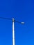 light pole with blue sky. minimalist photo