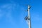 Light pole electric current blue sky high voltage wires detail panorama landscape nature
