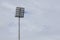 Light poles for lighting in stadiums are set up outdoors.