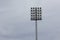 Light poles for lighting in stadiums are set up outdoors.