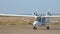 Light private twin-engined aircraft plane on the runway