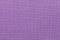 Light purple background from a textile material. Fabric with natural texture. Backdrop.