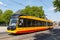 Light rail of AVG tram type Stadler CityLink public transport transit at stop main station in Karlsruhe, Germany