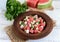 Light refreshing dietary gourmet salad with fresh watermelon, cucumbers