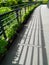 Light and shadow balcony and green plant walk path