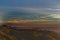 Light and shadow, colors and clouds over expansive New Mexico landscape