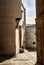 Light and shadow Sale. A street in the old city of Sale under the rays of the midday spring sun in front of a golden door