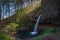 Light shining above upper Horsetail Falls at the Columbia River Gorge, Oregon