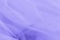 Light small mesh fabric on violet background. Shades of violet
