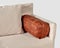 Light soft sofa with copper-colored leather bolster pillow