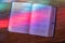 Light from stained glass window falls on open song book in american church