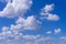 Light Stratocumulus clouds at deep blue sky.Natural sky background texture