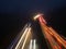 Light stripes of moving cars on a German Autobahn at night