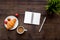 Light summer lunch. Coffee, strawberry, croissant on wooden background top view