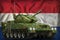 Light tank apc with summer camouflage on the Paraguay national flag background. 3d Illustration