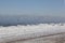 A light tower above a steamy Lake Michigan on a sub-zero winter