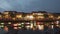 Light trails of boats with lanterns in ancient city Hoi An in Vietnam