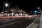 Light trails of busy traffic on Pacific Coast Highway & Main Street in Downtown Huntington Beach, CA