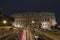 Light trails at Colosseum in Rome at dusk