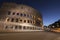 Light trails at Colosseum in Rome at dusk