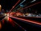 Light trails of the fast driving bus at the night city of Brisbane, Australia