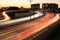 Light trails on a highway with high traffic during sunset