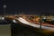 Light trails on highway I-35 in Dallas with Reunion Tower