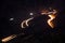 Light trails on Jabal Jais mountain road at night