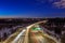 Light Trails Under A Blue Sky