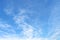 Light translucent cirrus clouds high in a blue spring or summer sky on a sunny day. Meteorology, weather and different cloud types