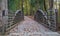 Light Trimmed Wooden Bridge on Park Trail