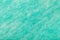 Light turquoise background of felt fabric. Texture of woolen textile