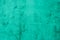 light turquoise or green wall background. beautiful vinage stucco background. abstract cement wall texture.