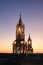 Light-up gorgeous bell tower of Basilica Cathedral of Arequipa against twilight sky, Arequipa, Peru