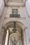 Light vaulted corridor with hanging lamps of Ribeira Palace