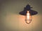 Light of vintage lamp in dark decorative on wall vintage tone.