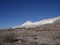 Light winter snow on eroded mountains