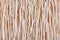 Light wooden sticks texture background.Uneven surface with natural thatch pattern and structure material.The concept of decoration