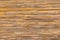 Light yellow reed interior pattern bamboo handmade wall wicker texture rattan background