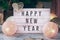 Lightbox with Happy New Year inscription .Christmas decorations, garland, balls and toys