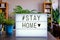 Lightbox written Stay Home with cinema letters.