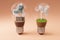 lightbulbs with minature wind turbine and coal-fired power station inside green soil and clouds pollution and smoke renewable