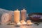lighted candles rolled up towel bath spa salt table. High quality photo