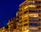 Lighted city apartments and buildings by night, Blankenberge, Belgium