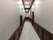 A lighted hallway with elegant decor