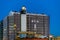 Lighted lighthouse with a building under construction in the background, architecture at the coast of blankenberge, Belgium, 15