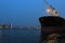 Lighted ship at apapa port, lagos after sunset . CMS is at the background in Lagos Nigeria